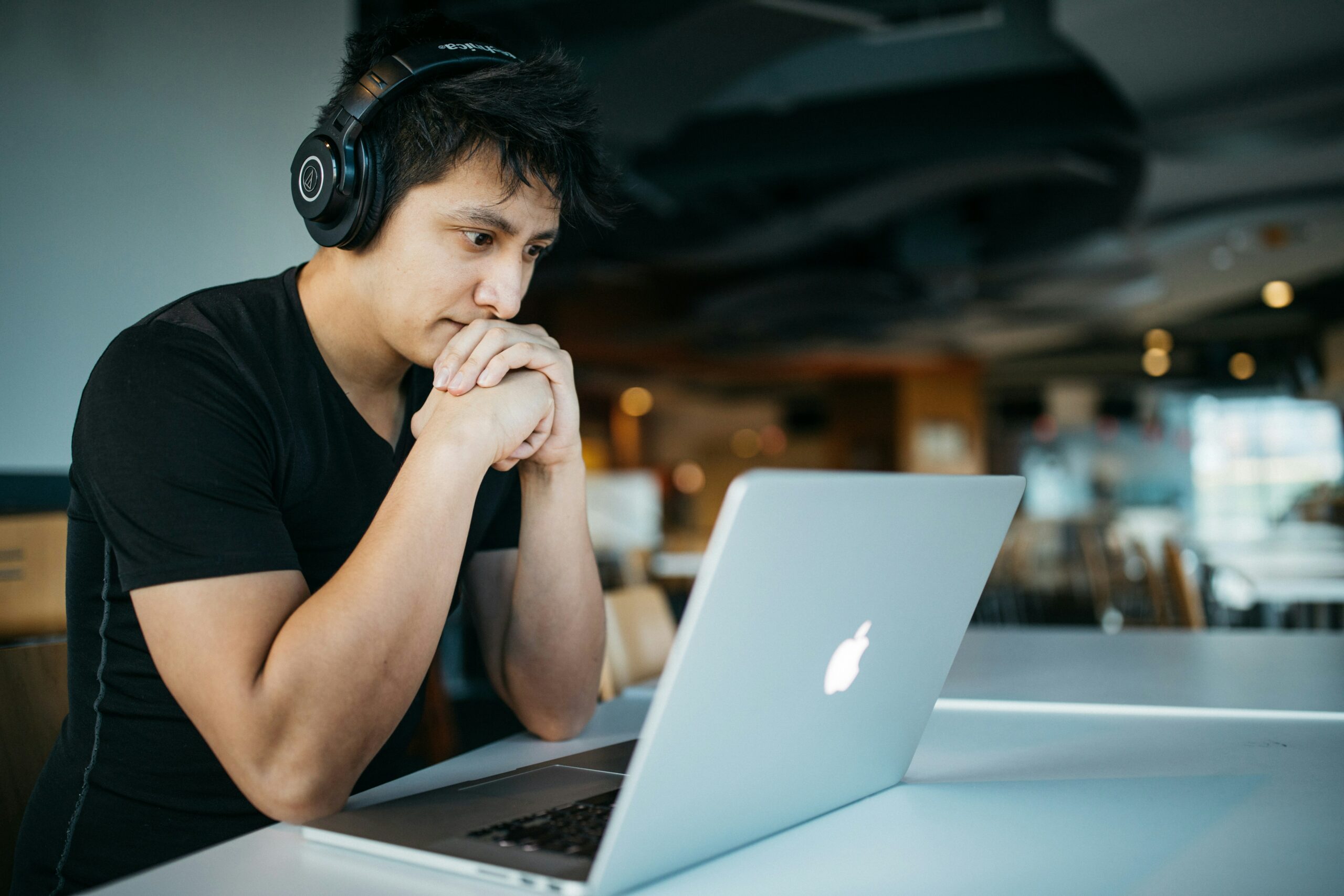 Person concentrating on laptop